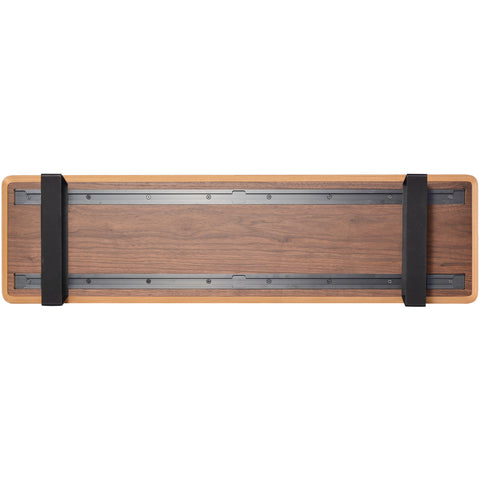 Artizo monitor stand underside showing dual slider track walnut grain and 6 accessory inlets