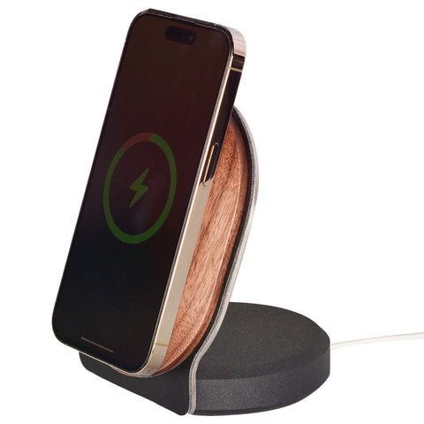 Elegantly crafted walnut MagSafe holder with a mounted iPhone.